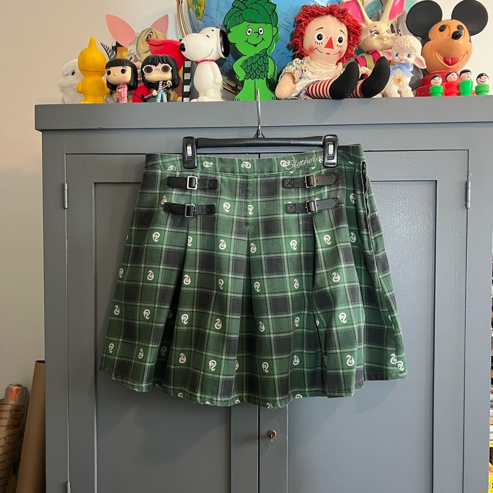 Green Plaid Harry Potter Slyterin house school girl skirt with 2-buckle detail.
